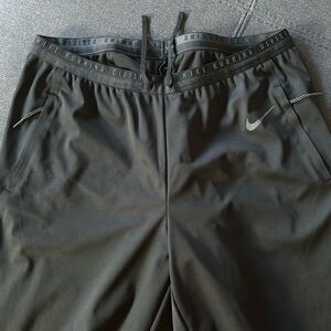Nike— black waterproof running joggers